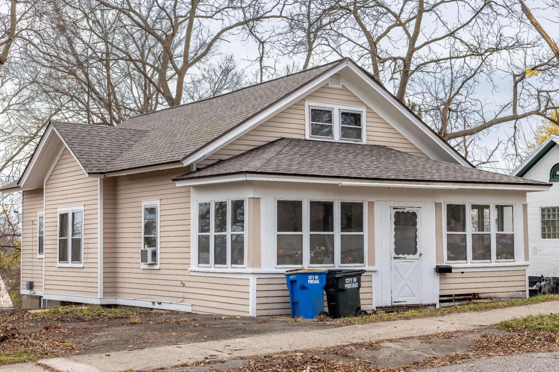 Freshly repainted home exterior with crisp white trim in Sun Prairie, Wisconsin